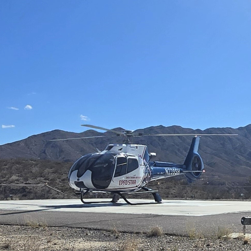 Image of a helicopter on a heli-pad